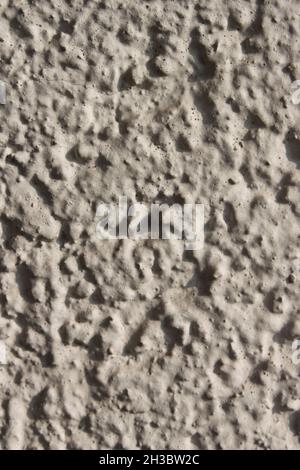 Eine hellgrau gemusterter Wand Stockfoto