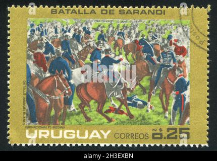 URUGUAY - UM 1975: Briefmarke gedruckt von Uruguay, zeigt Schlacht von Sarandi, um 1975 Stockfoto