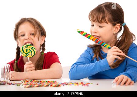 Mädchen essen Lutscher Stockfoto