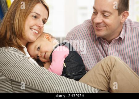 Eltern mit glücklichen Baby Stockfoto