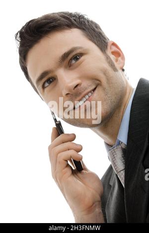 Geschäftsmann, der auf dem Mobiltelefon telefoniert Stockfoto