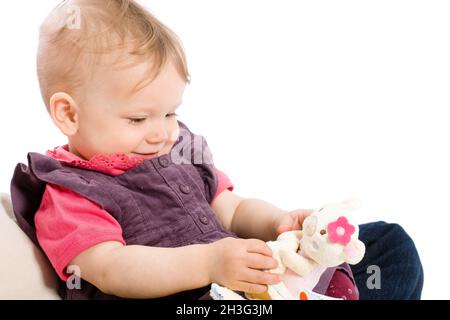 Babymädchen spielen Stockfoto