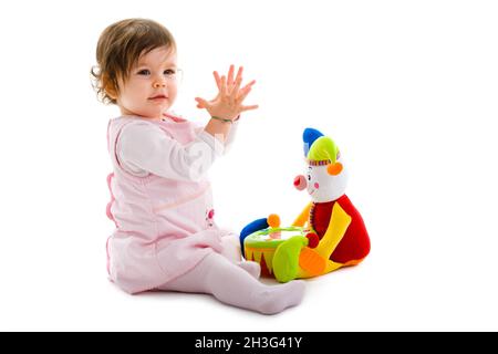 Baby spielt isoliert Stockfoto