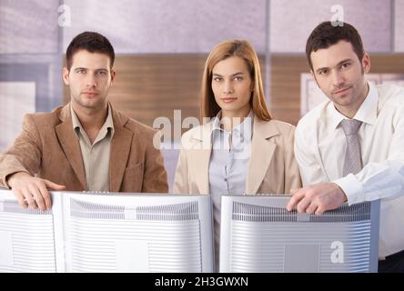 Porträt von zuversichtlich Geschäftsleute Stockfoto