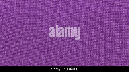 Gestrickter strukturierter lila Stoffhintergrund. Wunderschöne violette Stoffstruktur. Stockfoto