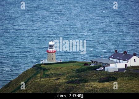 Sonnenuntergang auf dem Hügel des Howth Baily Leuchtturms Stockfoto