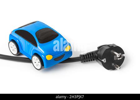 Netzstecker und Spielzeugauto Stockfoto