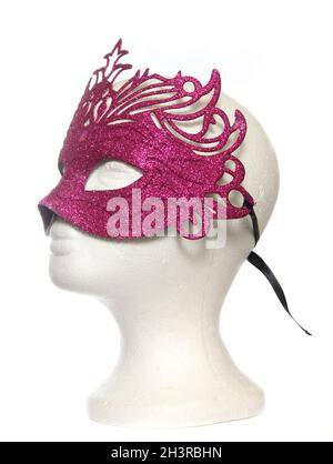 Rosa Karneval Mardi Gras Maske auf Mannequin Stockfoto