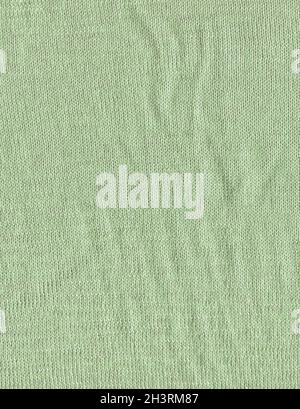 Stoff grüne Textur für Hintergrund und Design. Olivgrün abstrakt gewebte Strickmode Textil Hintergrund. Stockfoto