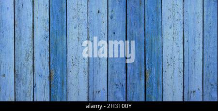 Blau sehr alte, bemalte Bretter mit abblätternder und rissiger Farbe. Abstrakter Vintage-Hintergrund Stockfoto