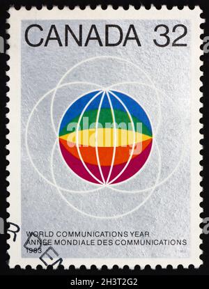 KANADA - UM 1983: Eine in Kanada gedruckte Marke, die dem weltweiten Kommunikationsjahr gewidmet ist, um 1983 Stockfoto