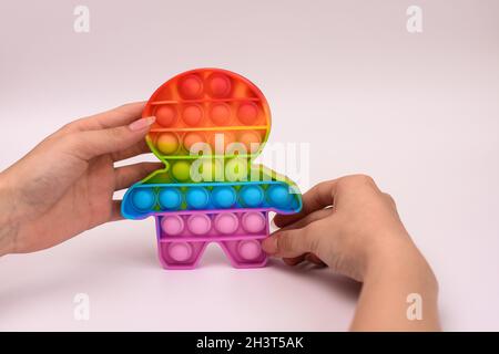 Berühren Sie Silikon-Gummi Pop es auf weißem Hintergrund. Stockfoto