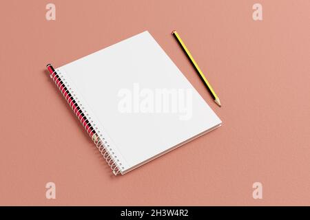 Spiralheft und Bleistifte mit leerem Einband. 3d-Illustration. Stockfoto