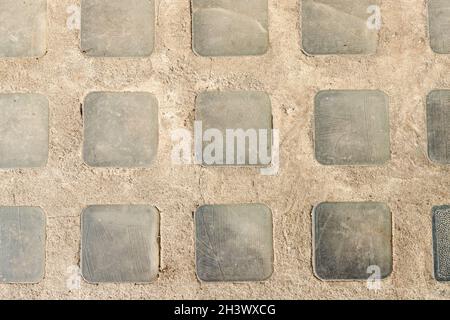 Zusammenfassung Hintergrund der alten gepflasterten Gehweg Nahaufnahme Stockfoto