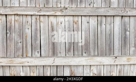 Grunge Plank Holz Textur Hintergrund. Nahaufnahme der grauen Holzzaunplatten Stockfoto