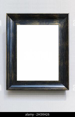 Leerer Vintage Bilderrahmen an der Wand Stockfoto