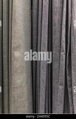 Set aus grauen, dichten Stoffen mit einheitlicher Textur. Stockfoto