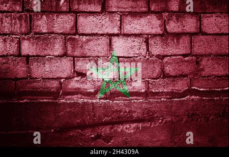 Dark brick wall with the flag Stockfoto