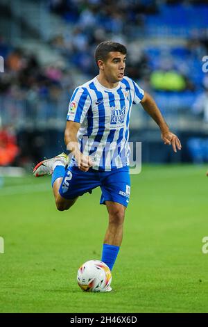 Malaga, Spanien. Oktober 2021. Victor Gomez in Aktion während des LaLiga SmartBank 2021/22-Spiels zwischen Malaga CF und CD Lugo im La Rosaleda Stadium. Endergebnis; Malaga CF 1:0 CD Lugo. (Foto von Francis Gonzalez/SOPA Images/Sipa USA) Quelle: SIPA USA/Alamy Live News Stockfoto