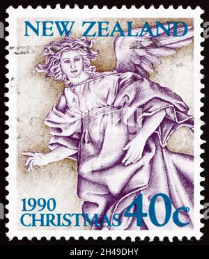 NEUSEELAND - UM 1990: Eine in Neuseeland gedruckte Briefmarke zeigt Engel, Weihnachten, um 1990 Stockfoto