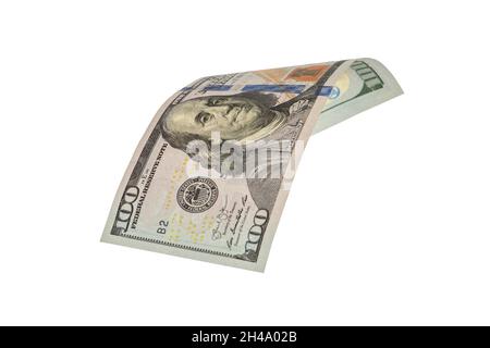 Isolieren Sie sich auf weißen hundert-Dollar-Scheinen. Das amerikanische Geld faltete sich in der Mitte, Nahaufnahme. Stockfoto