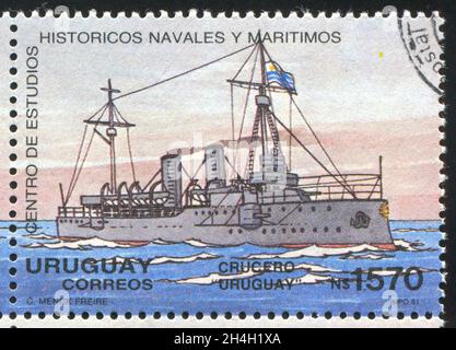 URUGUAY - UM 1991: Briefmarke gedruckt von Uruguay, zeigt Cruiser, um 1991 Stockfoto