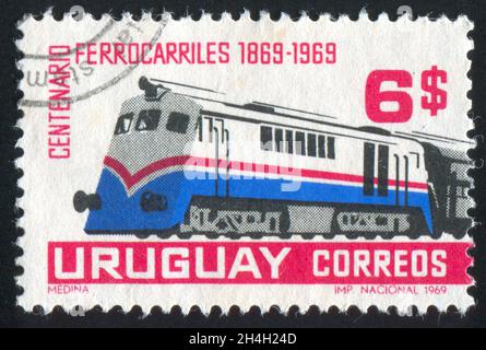 URUGUAY - UM 1969: Stempel gedruckt von Uruguay, zeigt Diesel Lokomotive, um 1969 Stockfoto