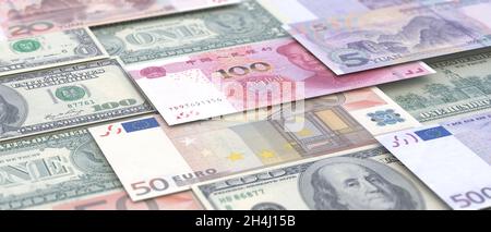 Hintergrund der Banknoten. China, die Vereinigten Staaten von Amerika und die Europäische Union in Papierwährungen. Chinesischer Yuan, EU-Euro und US-Dollar. Globale Wirtschaft Stockfoto