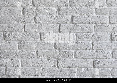 Abstrakt alten weißen strukturierten gemalten dekorativen Backstein Wand Hintergrund Stockfoto