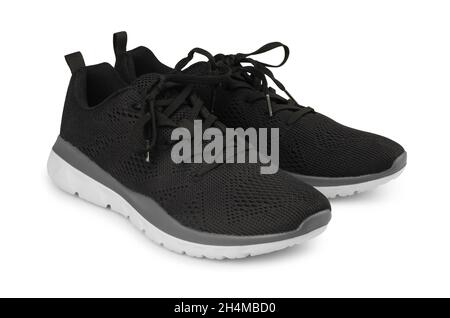 Paar schwarze Sportschuhe zum Laufen isoliert auf weißem Hintergrund Stockfoto