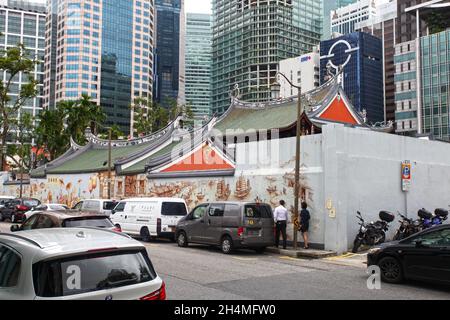 Thian Hock Keng Mural: Die Geschichte eines Einwanderers. Dieses Wandbild ist auf die äußere Rückwand des Thian Hock Keng-Tempels in der Amoy Street in Singapur gemalt. Stockfoto