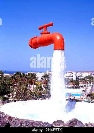 Orange Tap Brunnen im Octopus Aquapark, Playa de las Americas, Teneriffa, Spanien. Stockfoto