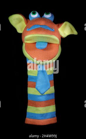 Sock Puppet Isoliert Auf Schwarzem Hintergrund Stockfoto