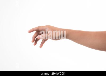 Hand nimmt etwas auf Stockfoto