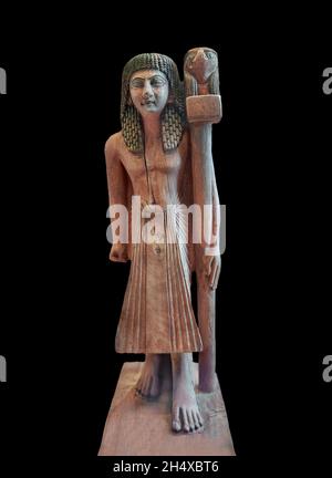 Ägyptische Holzskulptur eines Mannes mit einem Schild, 1295-1186 19. Dynastie, Dier el Medina,. Louvre Museum Inv. N854. Die Statue zeigt einen Mann stehend, Stockfoto