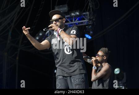 Ausländische Bettler im Konzert während des Lovebox Festivals 2013 im Victoria Park - London Stockfoto