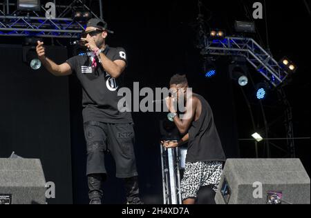 Ausländische Bettler im Konzert während des Lovebox Festivals 2013 im Victoria Park - London Stockfoto