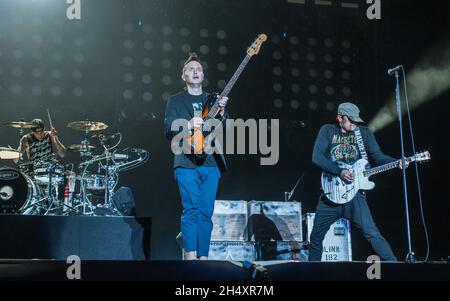 Tom DeLonge, Mark Hoppus und Travis Barker von Blink 182 live auf der Bühne am 1. Tag des Leeds Festivals am 22. August 2014 im Bramham Park, Leeds Stockfoto