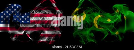 Vereinigte Staaten von Amerika gegen Australien, Australien, Kokosinseln Rauchflaggen nebeneinander platziert Stockfoto
