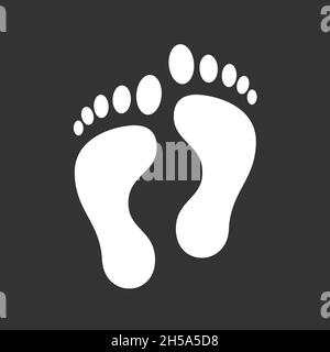 Weißer Fußabdruck auf schwarzem Hintergrund isoliert. Stockfoto