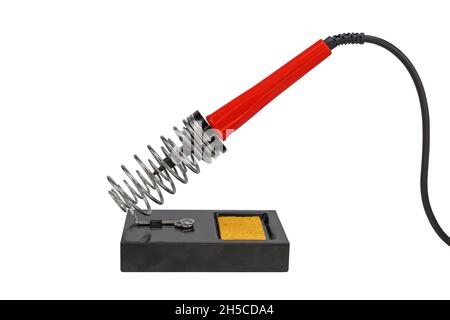 Lötkolbenständer mit rotem Elektrolot isoliert auf weißem Hintergrund Stockfoto