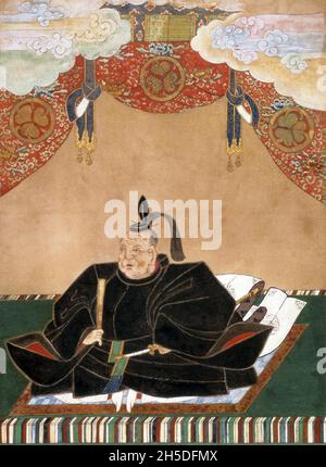 Japan: Tokugawa Ieyasu (31. Januar 1543 – 1. Juni 1616), Gründer und erster Herrscher des Tokugawa-Shogunats (1600-1868). Hängende Schriftrolle von Kano Tan'yu (1602-1674), 17. Jahrhundert. Tokugawa Ieyasu, geboren als Matsudaira Takechiyo, war der Gründer und erste Shogun des Tokugawa-Shogunats von Japan, das von der Schlacht von Sekigahara 1600 bis zur Meiji-Restauration 1868 regierte. Ieyasu ergriff 1600 die Macht, erhielt 1603 die Ernennung zum Shogun, dankte 1605 vom Amt ab, blieb aber bis zu seinem Tod 1616 an der Macht. Ieyasu wurde posthum in Nikkō Tōshō-gū verankert. Stockfoto