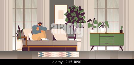 Unglücklicher depressiver Mann sitzt auf dem Sofa Kerl Gefühl verzweifelt und einsam psychische Gesundheit Krankheiten Depression Stress Stock Vektor