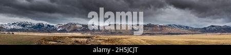 Oquirrh Mountains und Kennecott Copper Mine Winter Storm Panorama - Salt Lake City, Utah Stockfoto