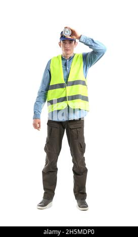 Junger männlicher Arbeiter mit Stirnlampe Taschenlampe auf weißem Hintergrund Stockfoto