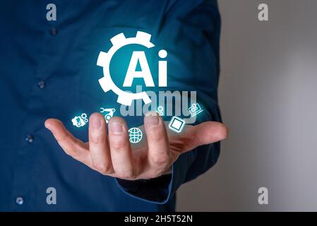 Ein Geschäftsmann auf einem verschwommenen Hintergrund mit einem digitalen Symbol für künstliche Intelligenz. Das Konzept der künstlichen Intelligenz der Zukunft. Stockfoto