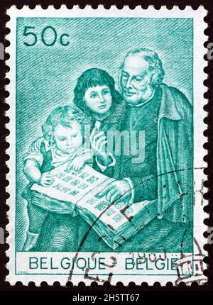 BELGIEN - UM 1965: Eine in Belgien gedruckte Briefmarke zeigt Sir Rowland Hill als Philatelist, um 1965 Stockfoto