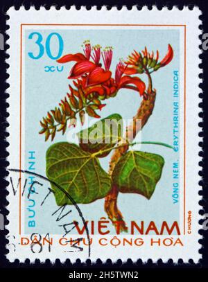 VIETNAM - UM 1975: Eine in Vietnam gedruckte Marke zeigt Tigerklaue, erythrina indica, Heilpflanze, um 1975 Stockfoto