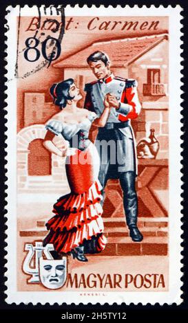 UNGARN - UM 1967: Eine in Ungarn gedruckte Briefmarke zeigt die Opernszene von Carmen, von Bizet, um 1967 Stockfoto