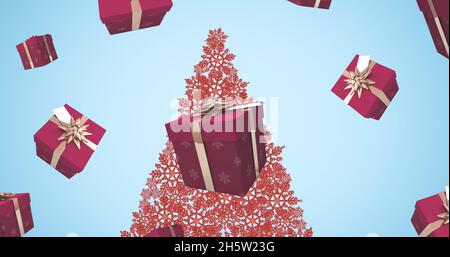 Bild von weihnachtsbaum über Geschenke fallen Stockfoto